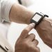 a hand wearing watch for time tracking