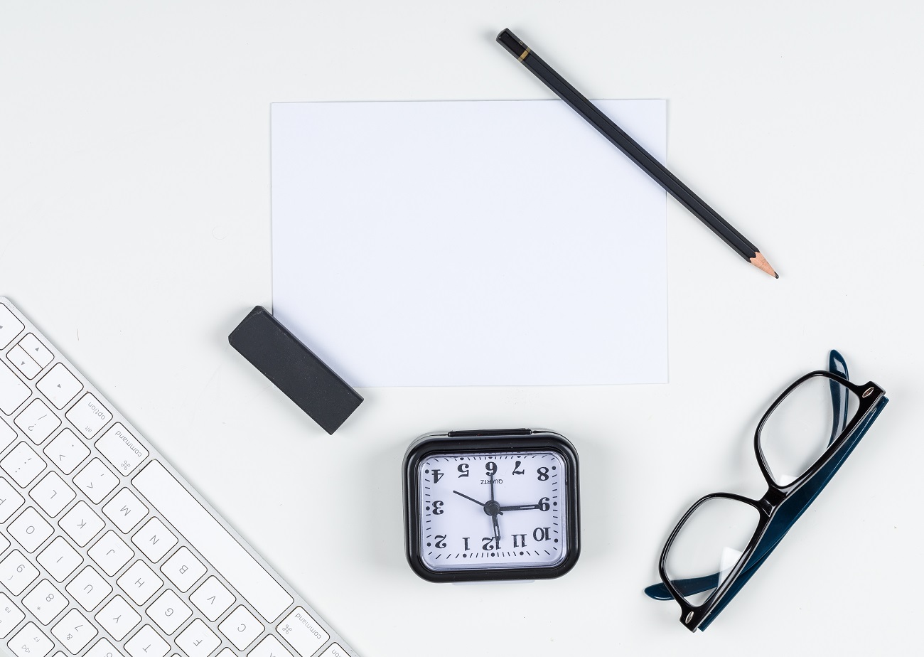 Clock, Glasses, Pencil and keyboard picture for project planning